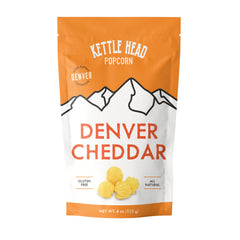 Kettle Head Popcorn front packaging showing bold cheddar branding and snack benefit
