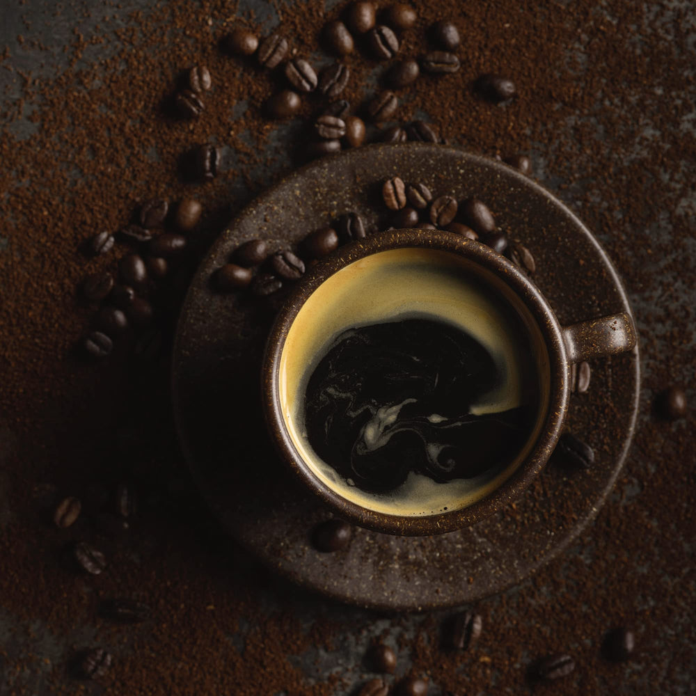 Kicking Horse grounds in a French press demonstrating full-bodied brew potential