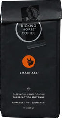 Kicking Horse Smart Ass grounds close-up highlighting medium-fine grind and aromatic texture