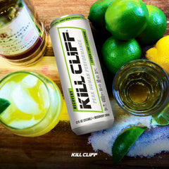 Kill Cliff pouring into glass with citrus splash highlighting refreshing electrolyte boost