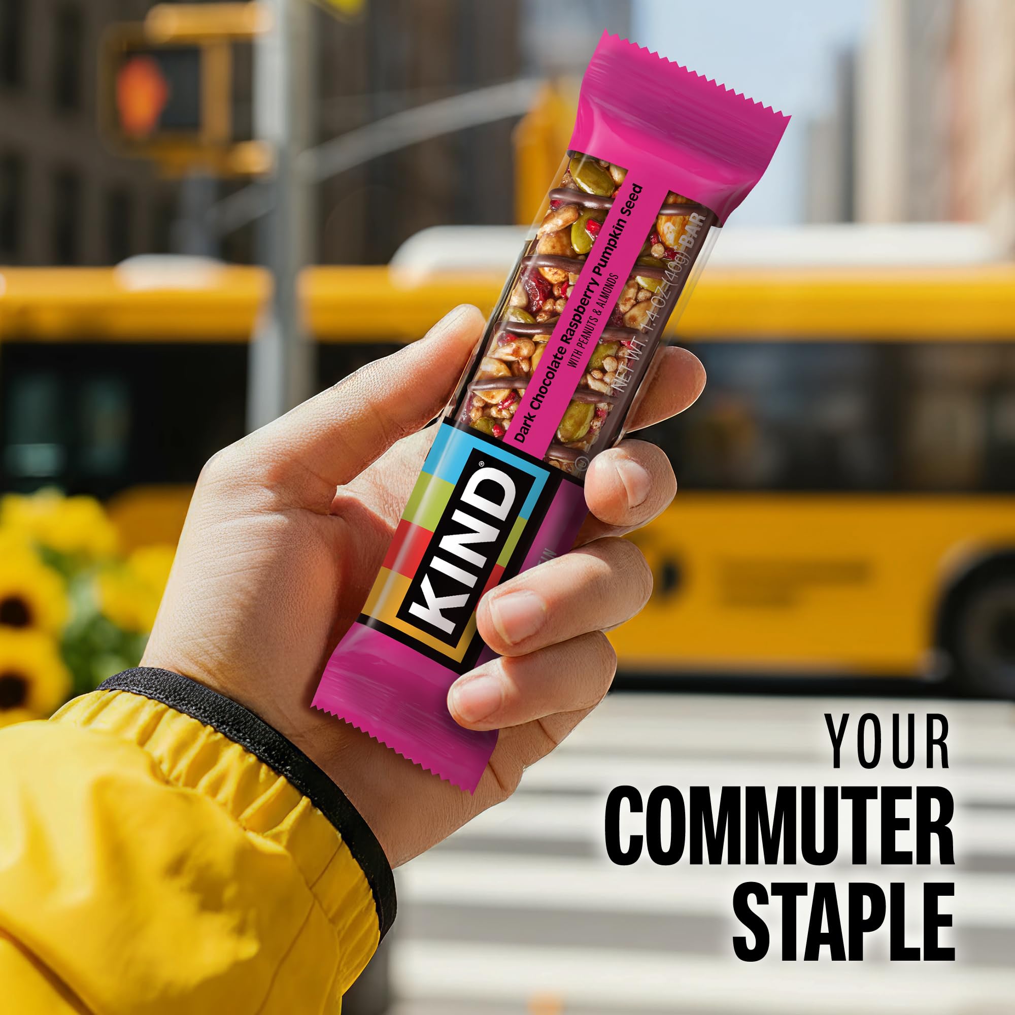 KIND individually wrapped bar opened to show inside, promoting portable nutrition