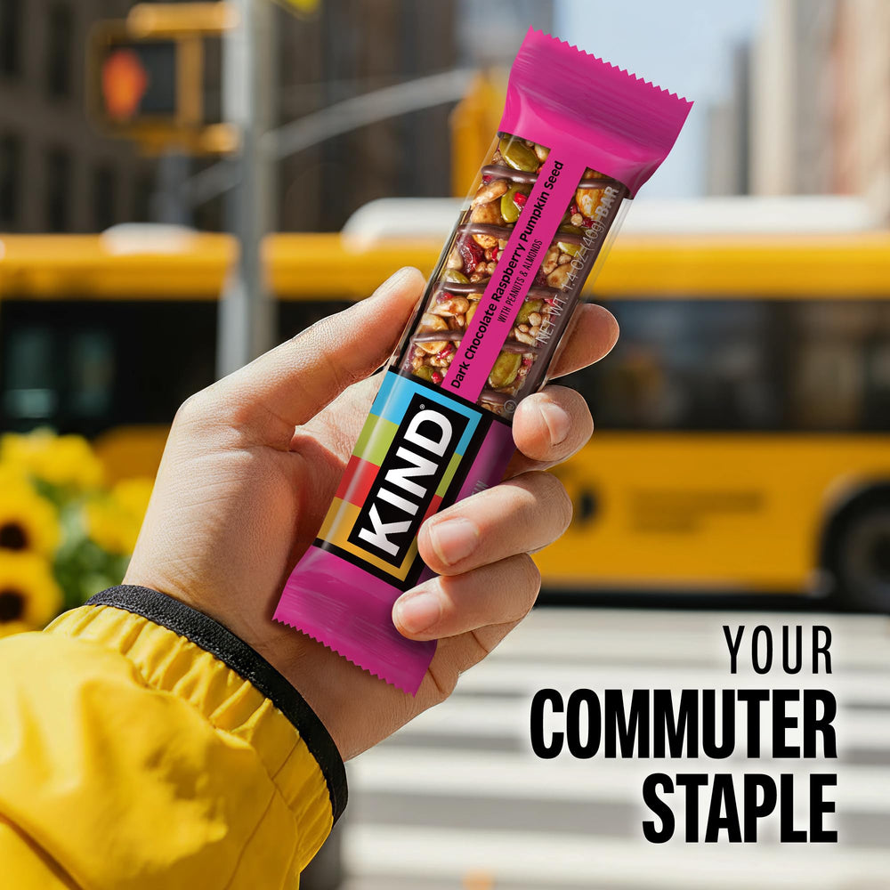 KIND individually wrapped bar opened to show inside, promoting portable nutrition