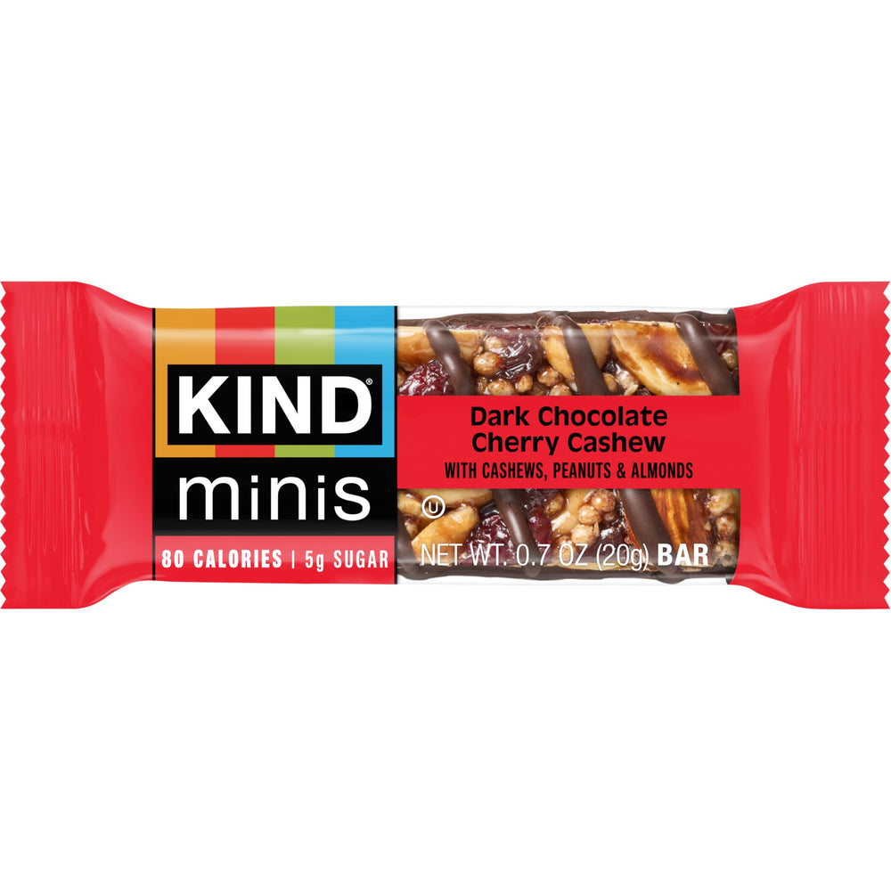 KIND minis on an office desk with coffee to portray quick energy boost convenience