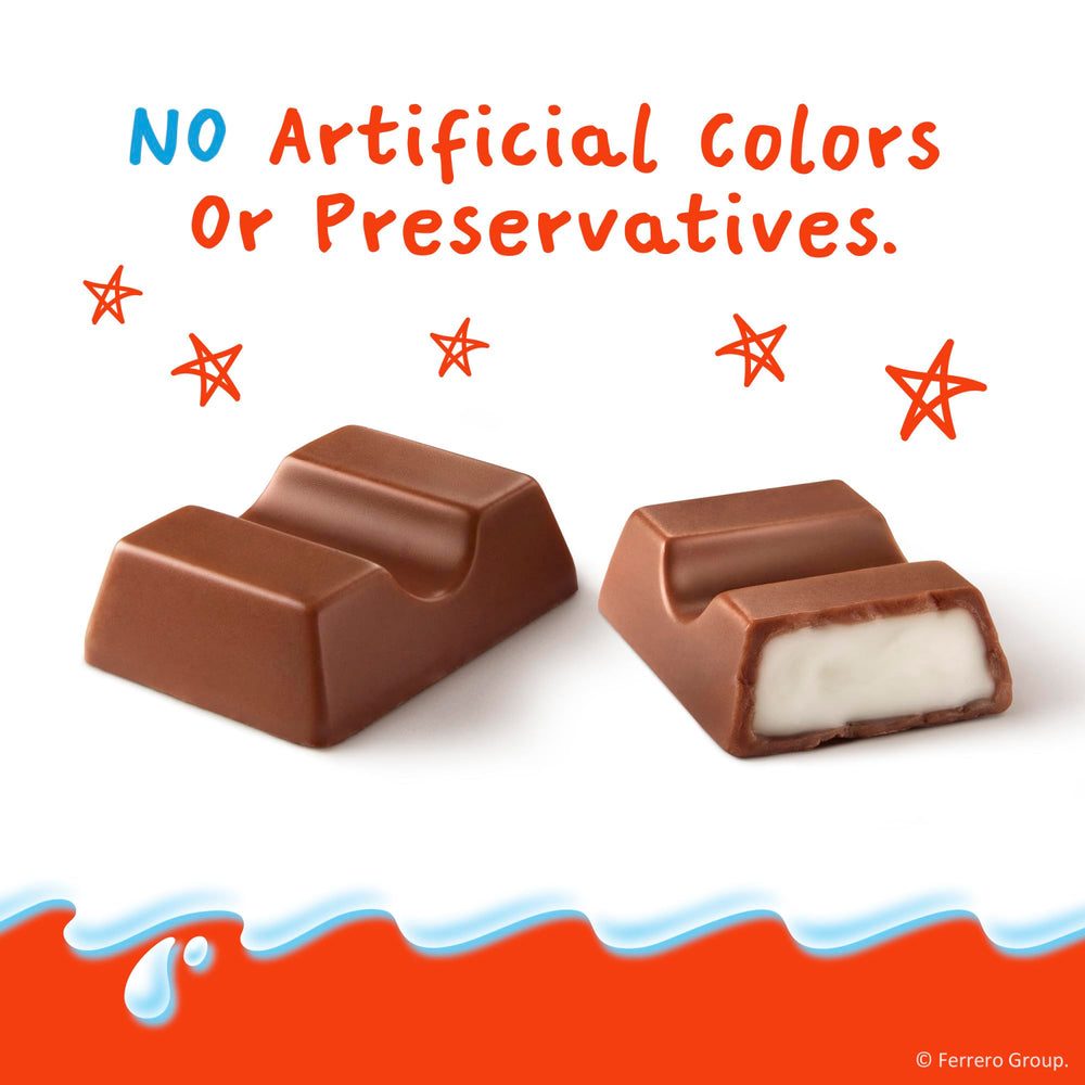 Kinder Chocolate child holding a mini bar enjoying family-friendly treat