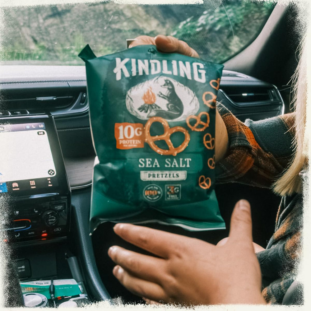 Sixteen-pack box of Kindling pretzels arranged neatly emphasizing bulk value and supply