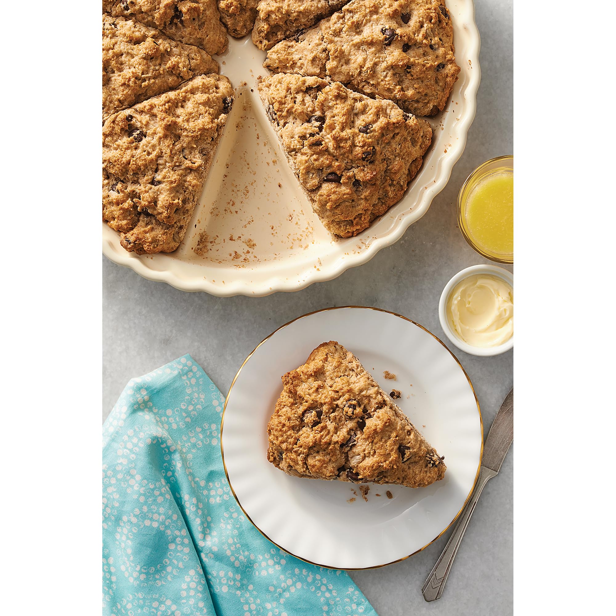 King Arthur pan on rustic table with served scones for oven-to-table serving convenience