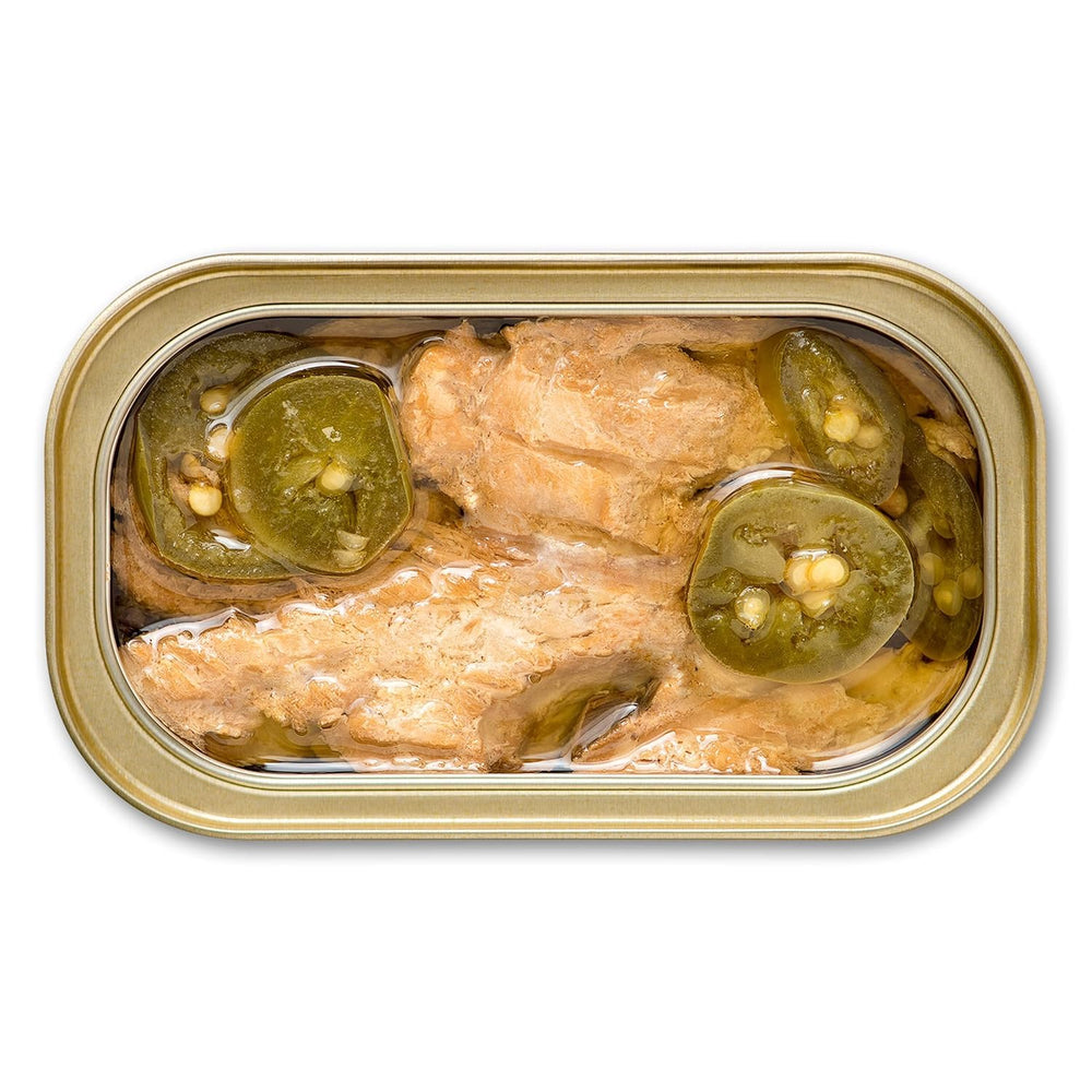 King Oscar detailed texture of flaked mackerel, illustrating tender, hand-filleted quality