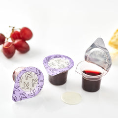 Kingdom single cup close-up displaying sealed juice and wafer benefit