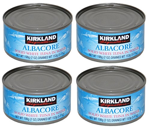 Costco Kirkland front packaging showing four tuna cans and clear label, convenient pantry protein