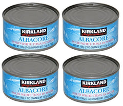Costco Kirkland front packaging showing four tuna cans and clear label, convenient pantry protein