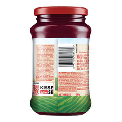 Kissan spoonful close-up showing fruit pulp texture and spreadability benefit