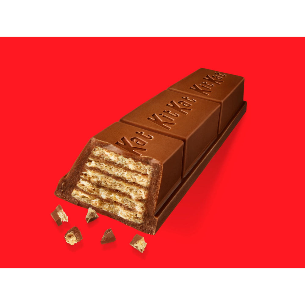 Kit Kat BIG KAT unwrapped bar closeup showing thick wafer and creamy chocolate