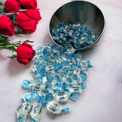 KLUB BULK pile of individually wrapped blue mints ready to serve