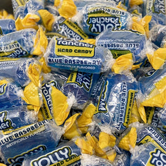 KLUB BULK candy in a hand illustrating scale and portioning for event use