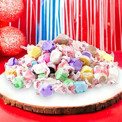 Klub Bulk open bag spilling assorted wrapped taffy, convenient for quick serving