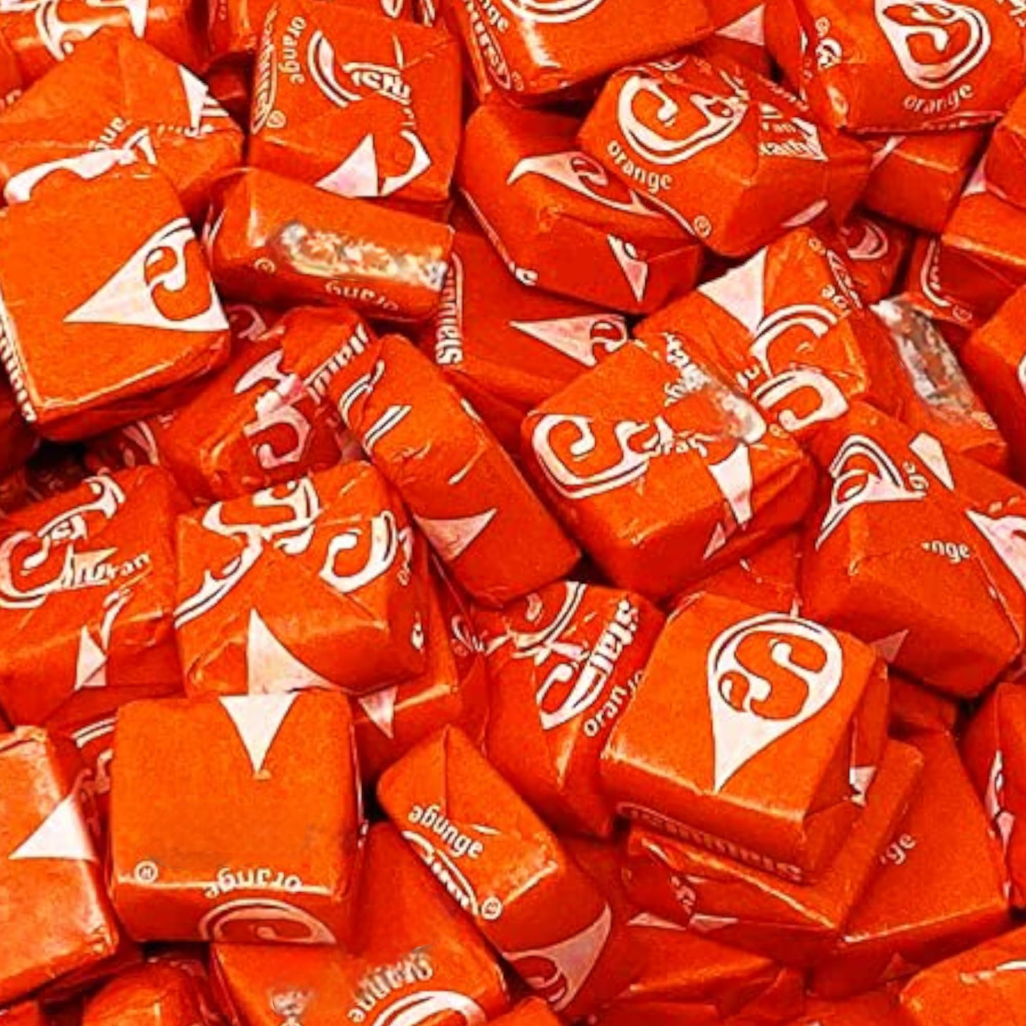 KLUB BULK close-up of soft orange candy texture highlighting chewy bite satisfaction