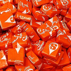 KLUB BULK close-up of soft orange candy texture highlighting chewy bite satisfaction