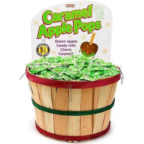 KLUB BULK lollipop held in hand showing size and convenient, mess-free snacking benefit