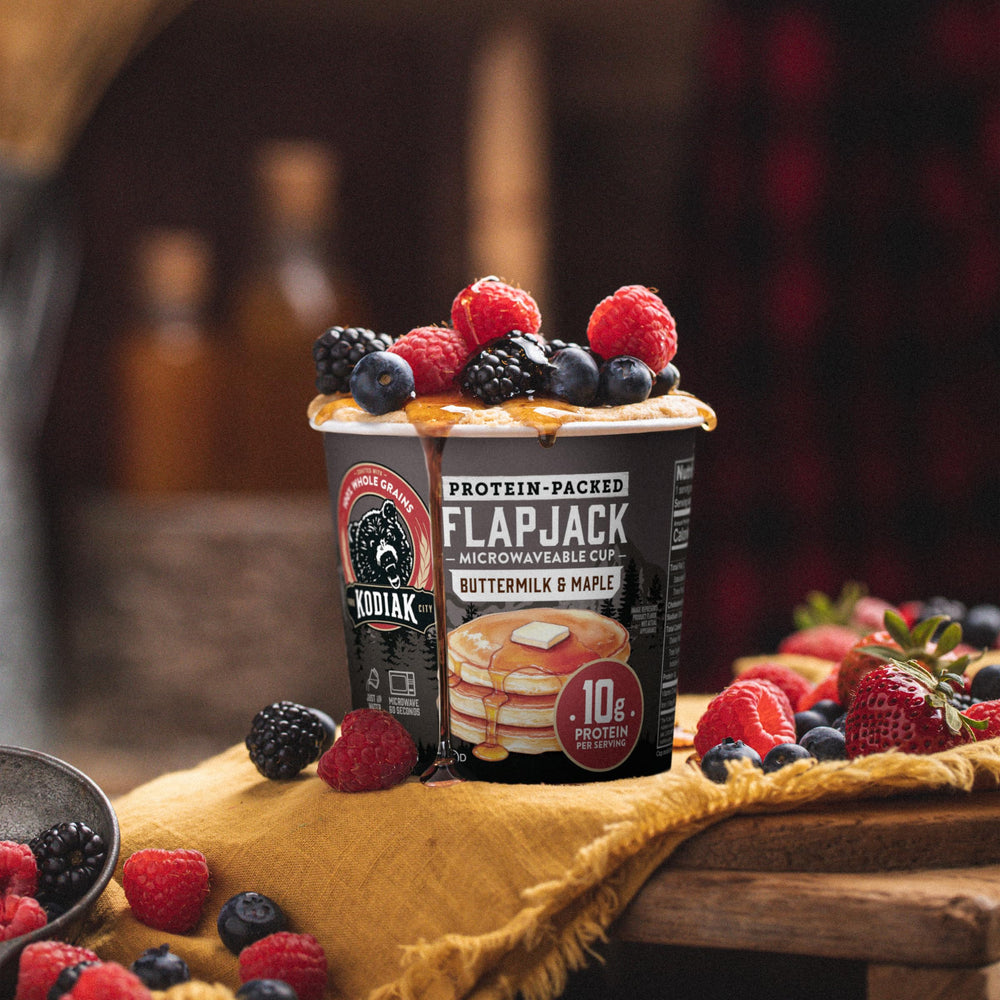 Kodiak Cakes served on breakfast table with fruit, illustrating convenience