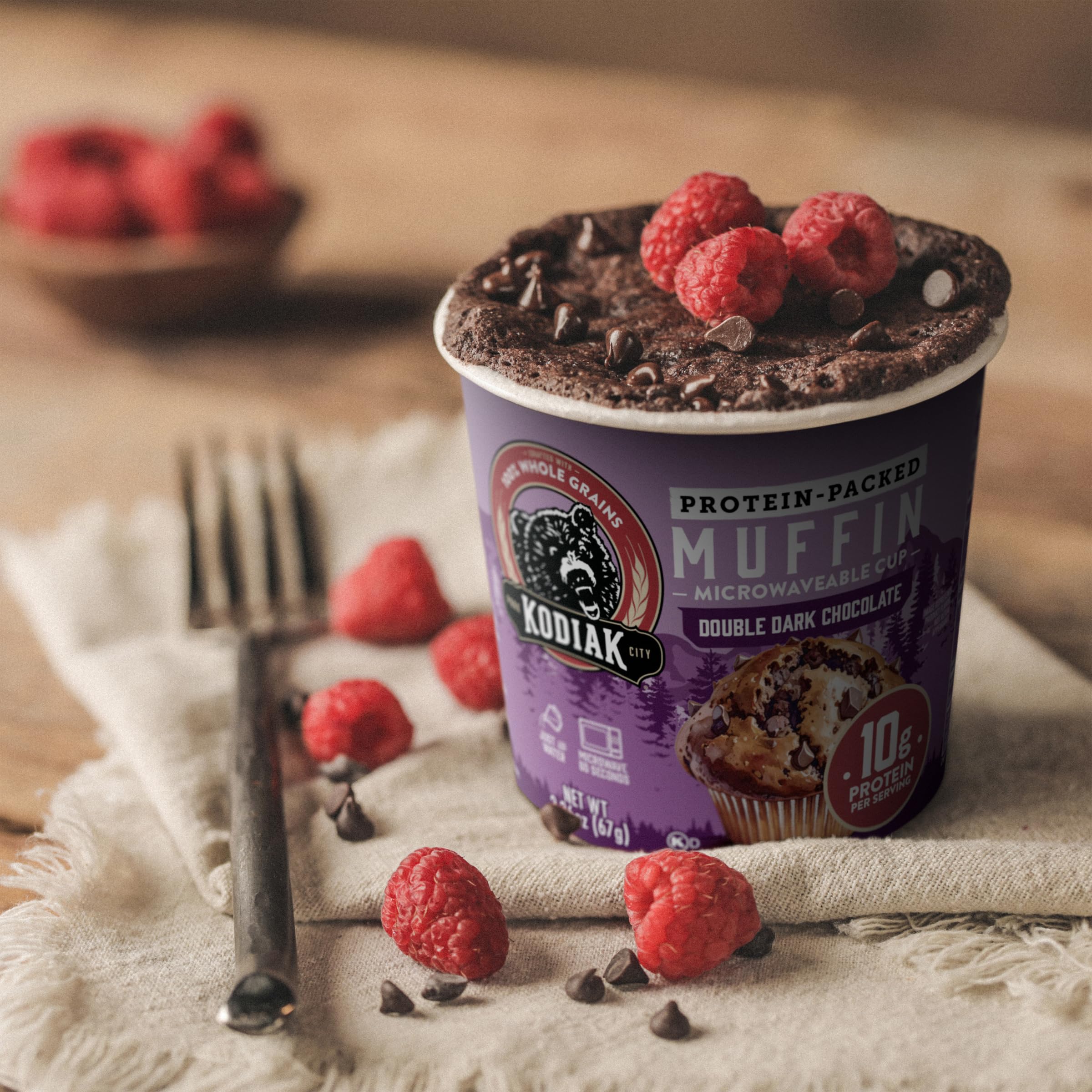 Kodiak Cakes muffin on breakfast table showing whole-grain, protein benefit