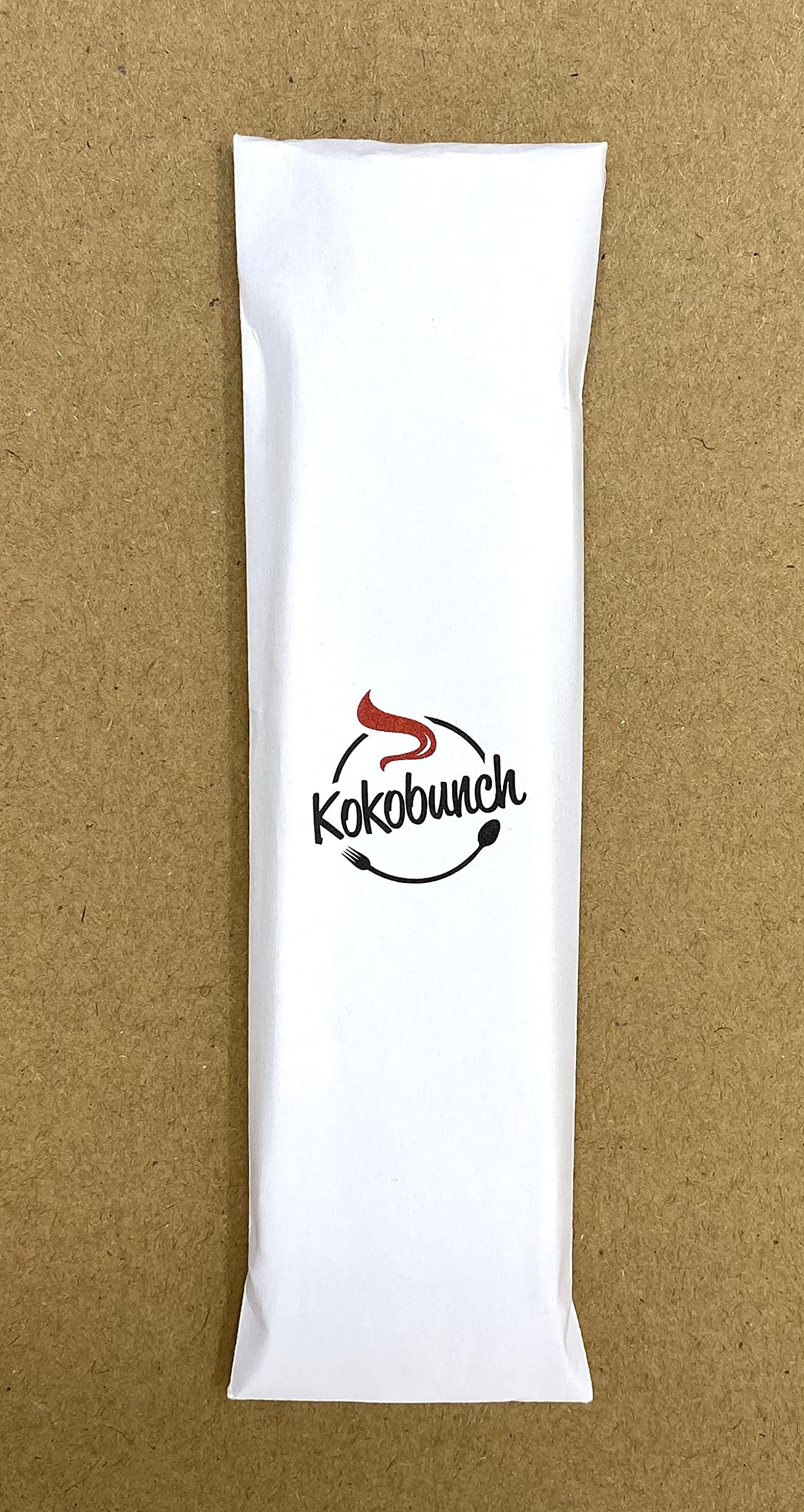 KOKOBUNCH size comparison beside a hand, demonstrates portable 5.5oz bag convenience
