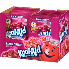 Hand holding a Kool-Aid black cherry packet next to a two-quart pitcher for scale and convenience