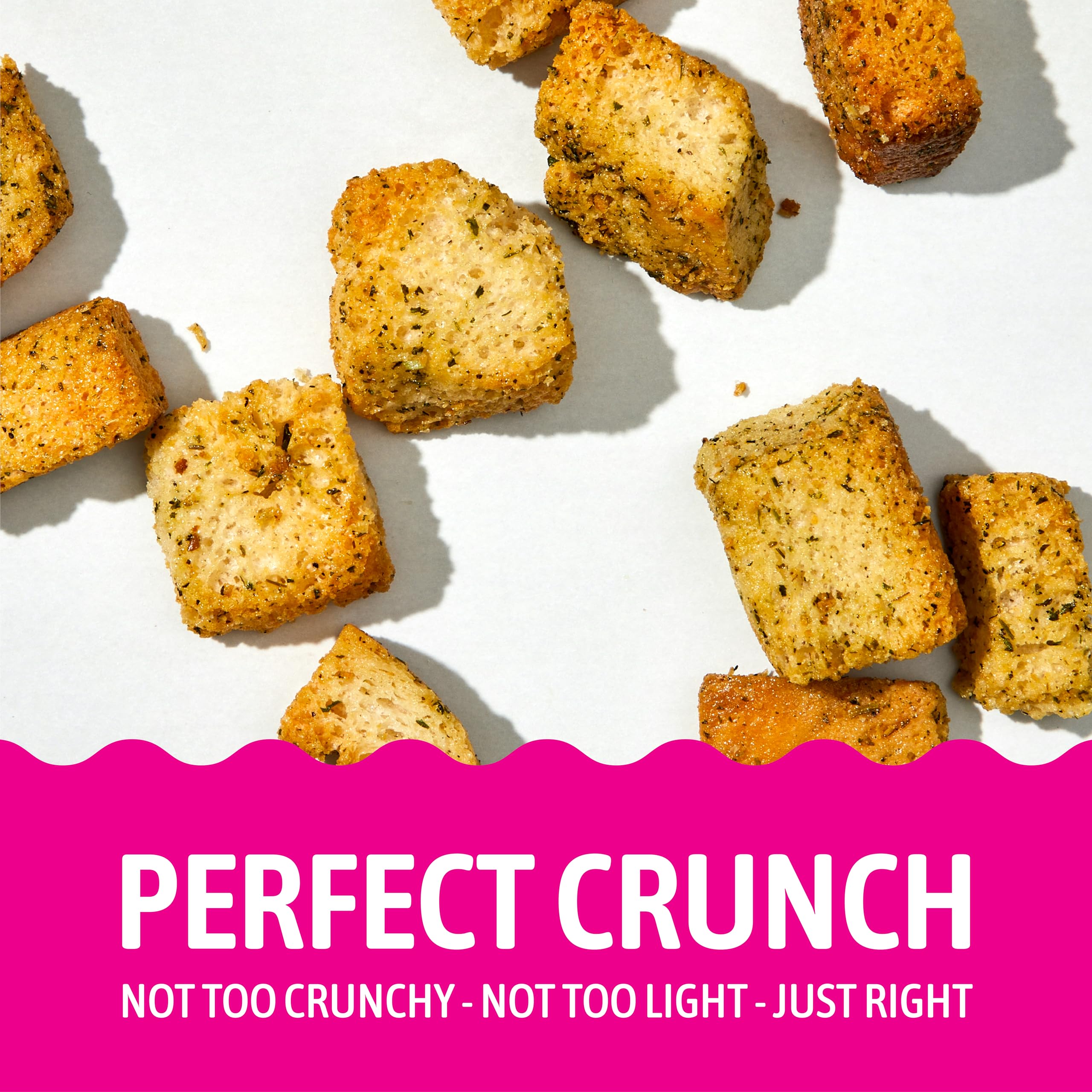 Kooshy Croutons sprinkled on salad emphasizing boosted flavor