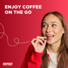 Kopiko Focus candy in hand demonstrating pocket-sized scale
