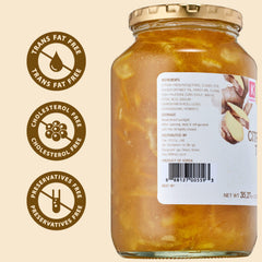 KPANTRY spoon stirring preserve into mug illustrating quick hot yuja tea preparation