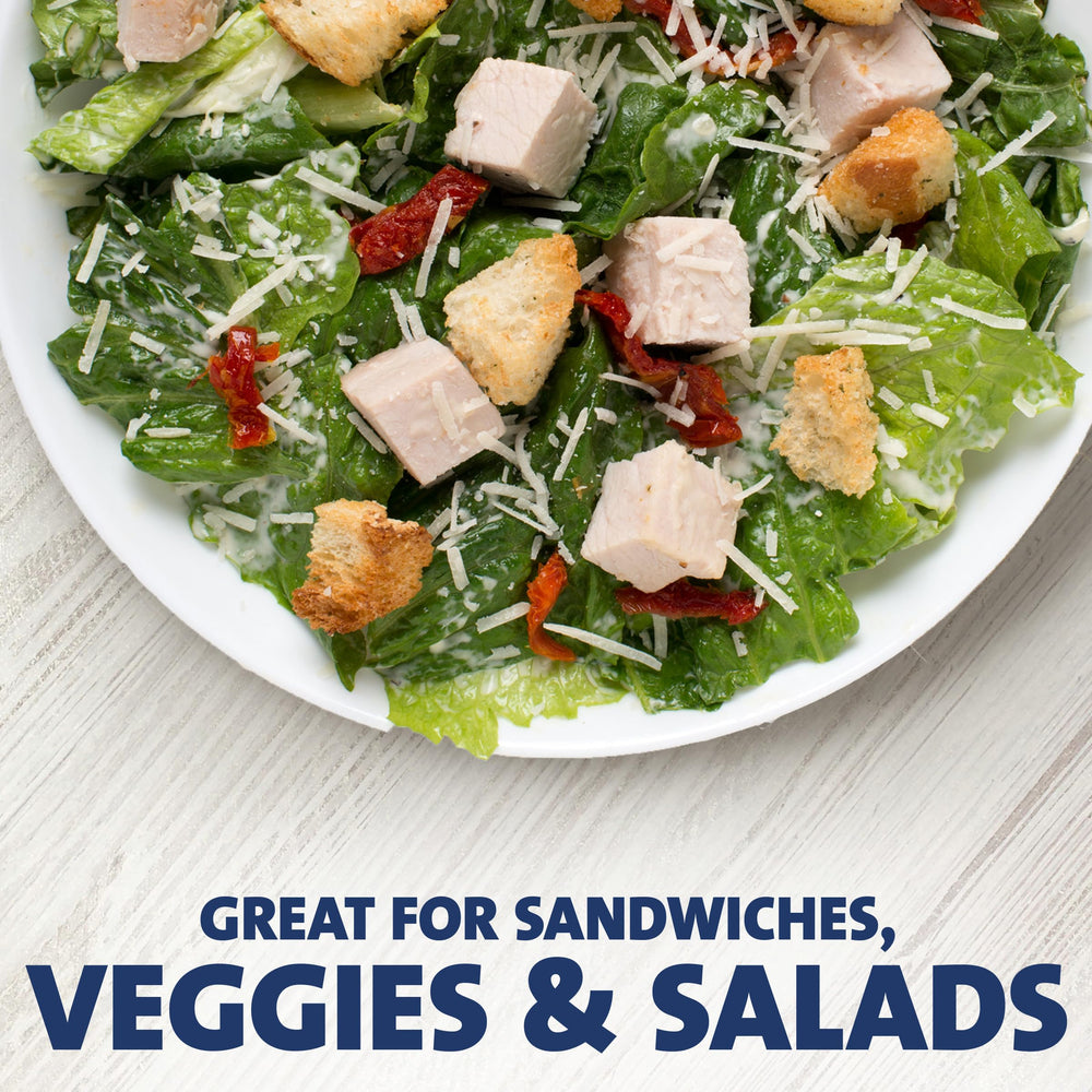 Kraft Caesar packets arranged on a catering tray for convenient event service