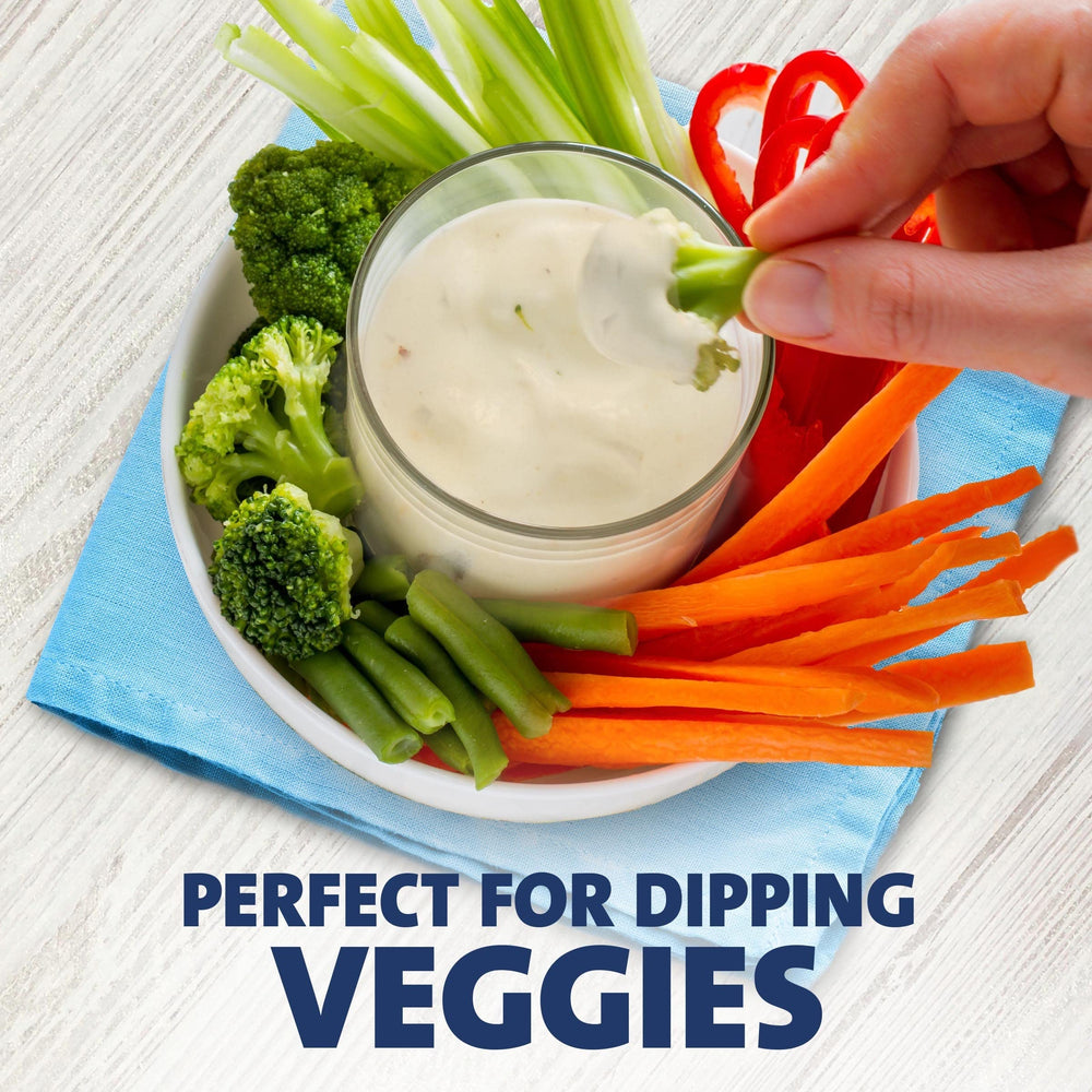 Kraft Ranch served in ramekin beside salad and wings highlighting dipping versatility