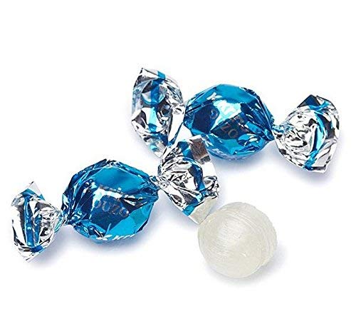 Krinos candy held in hand for scale showing portion size and grab-and-go convenience
