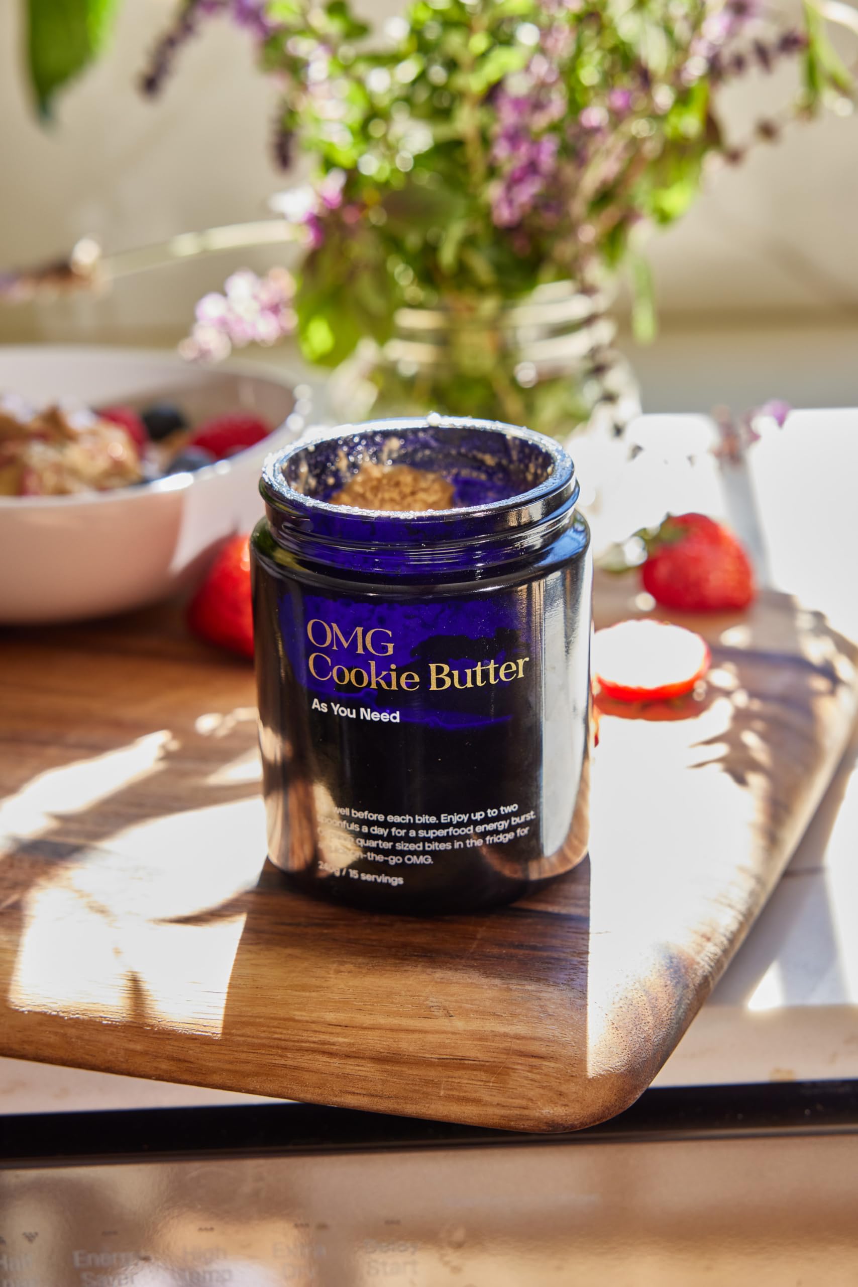 KROMA OMG Cookie Butter next to a measuring spoon for size and portion context