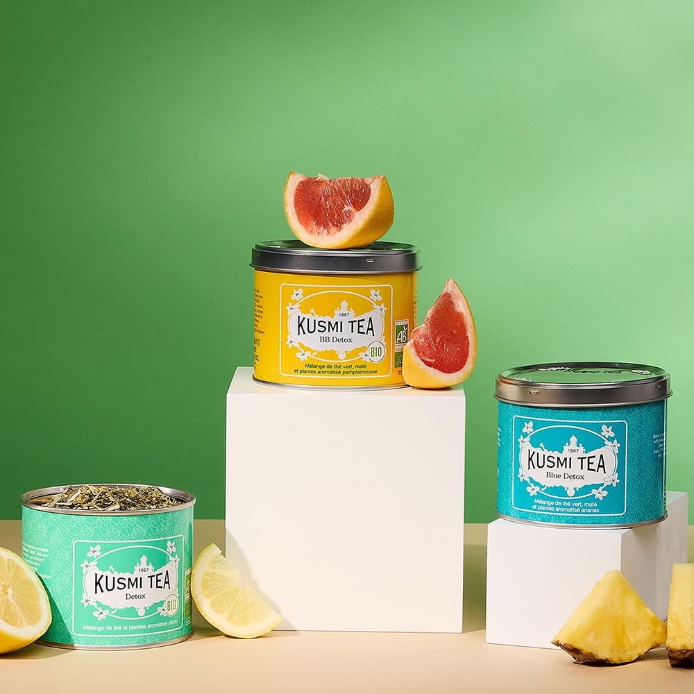 Hand holding Kusmi Tea BB Detox tin to show size and portability benefits