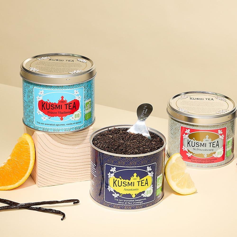 Kusmi Tea tin on a breakfast table with pastry, evokes morning ritual and indulgent flavor