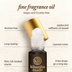 Kuumba Made bottle in hand demonstrating small size and easy portability