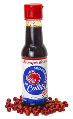 SALSA MARISQUERA LA CALLITA drizzled over shrimp tacos showing added taste boost