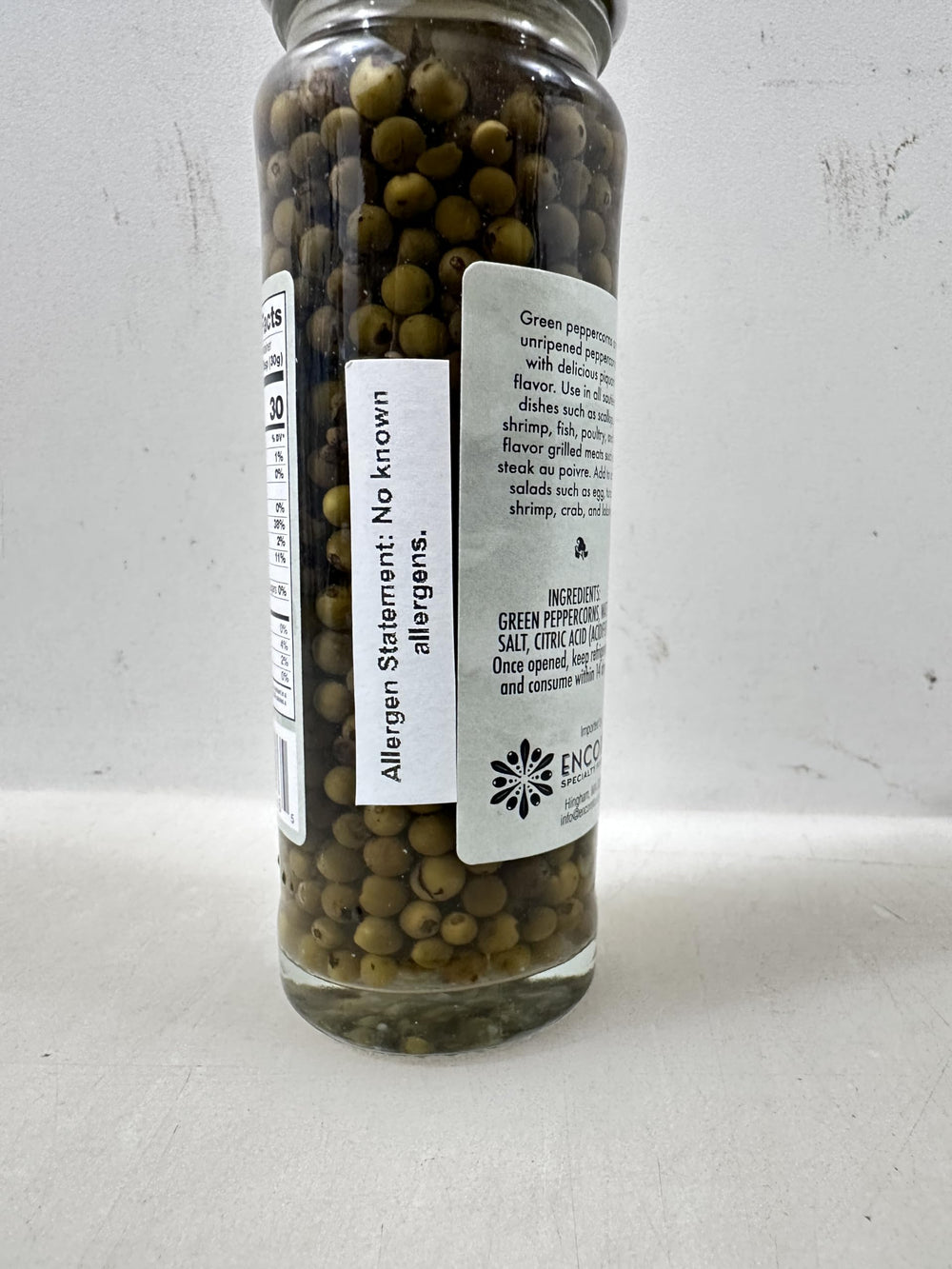 La Caperelle jar beside measuring spoon showing compact 3.5 oz size