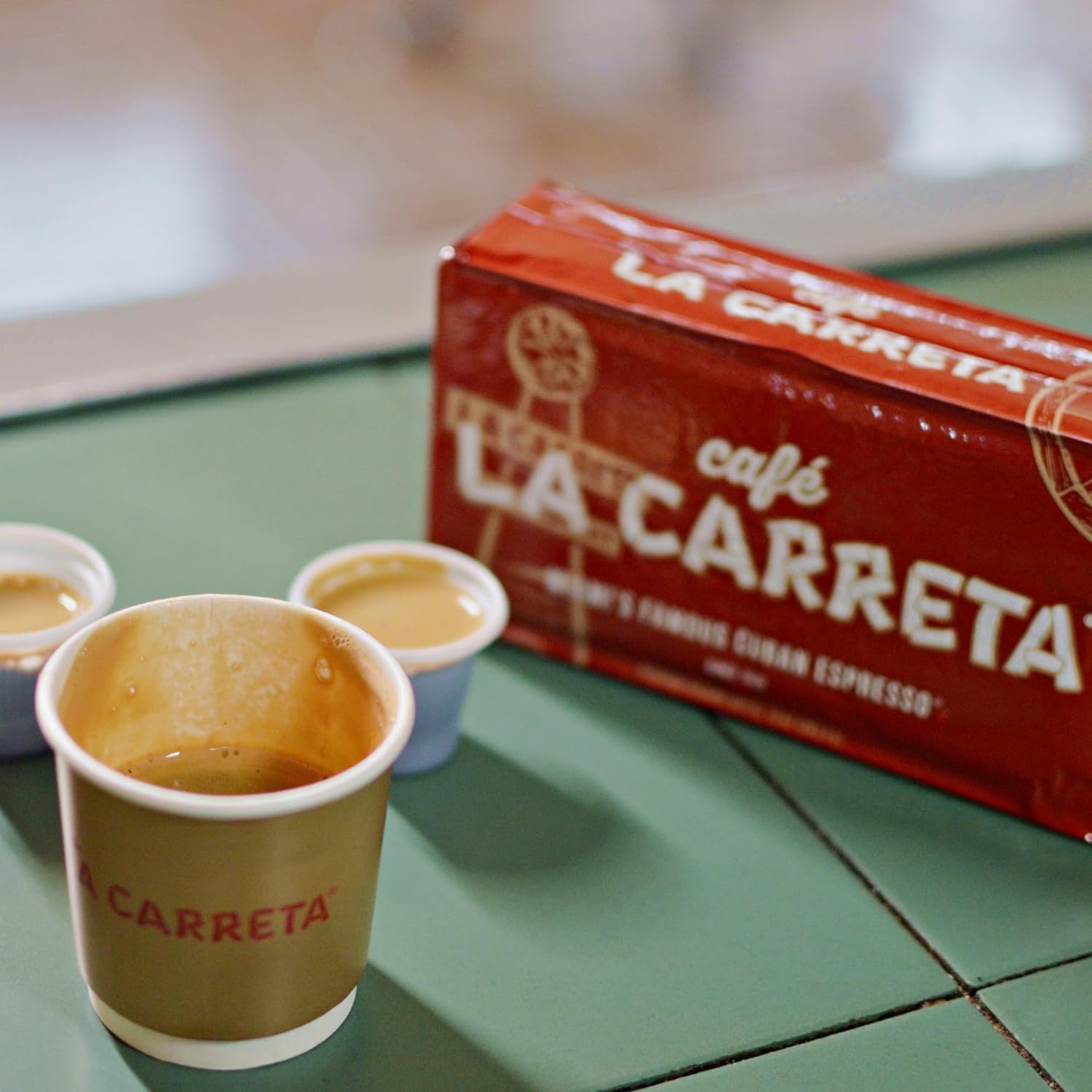 La Carreta served in a kitchen scene with cup and sugar for authentic Cuban enjoyment