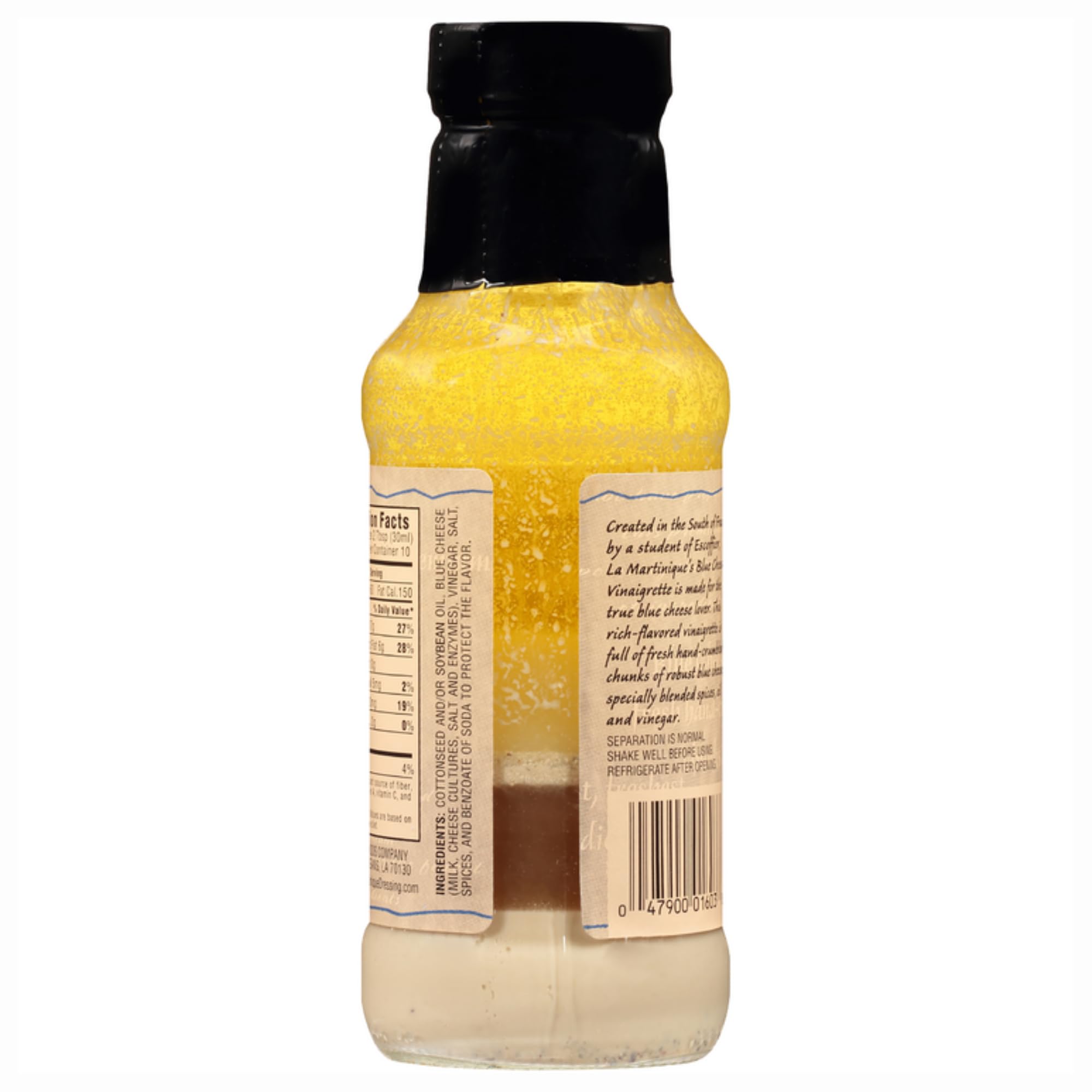 La Martinique bottle pouring vinaigrette to show pourability and bold flavor