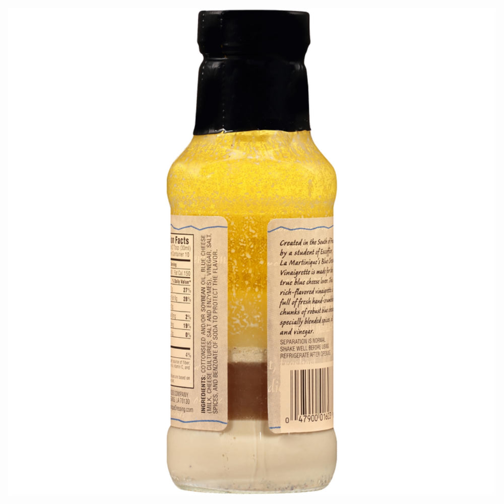 La Martinique bottle pouring vinaigrette to show pourability and bold flavor