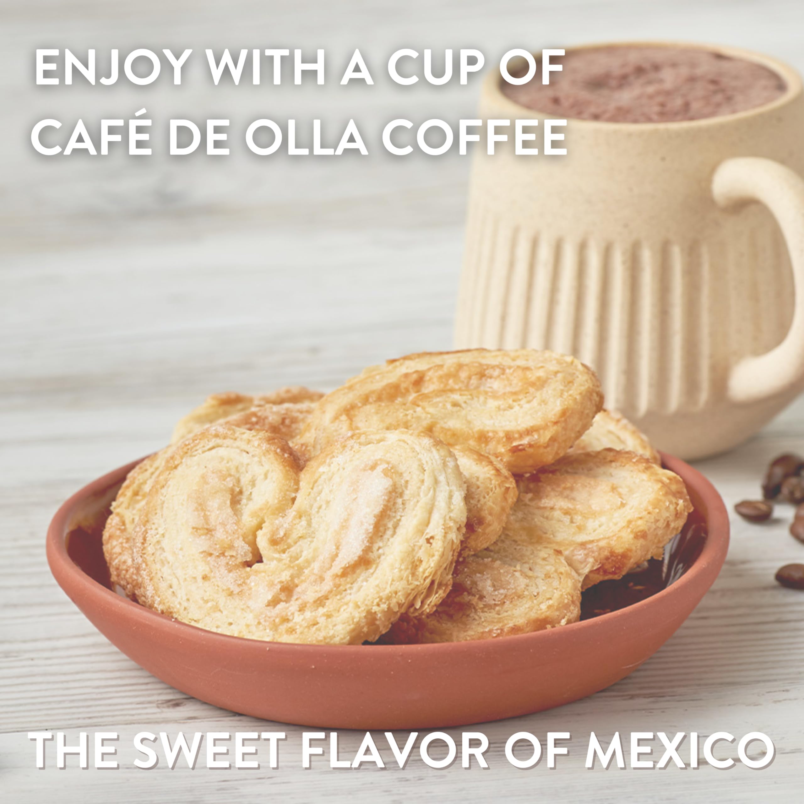 La Monarca Bakery palmiers next to coffee cup for scale and perfect pairing