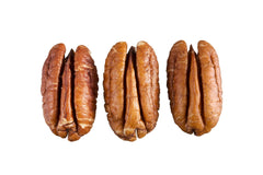 La Nogalera pecan halves in white bowl ready as ingredients to add healthy fats