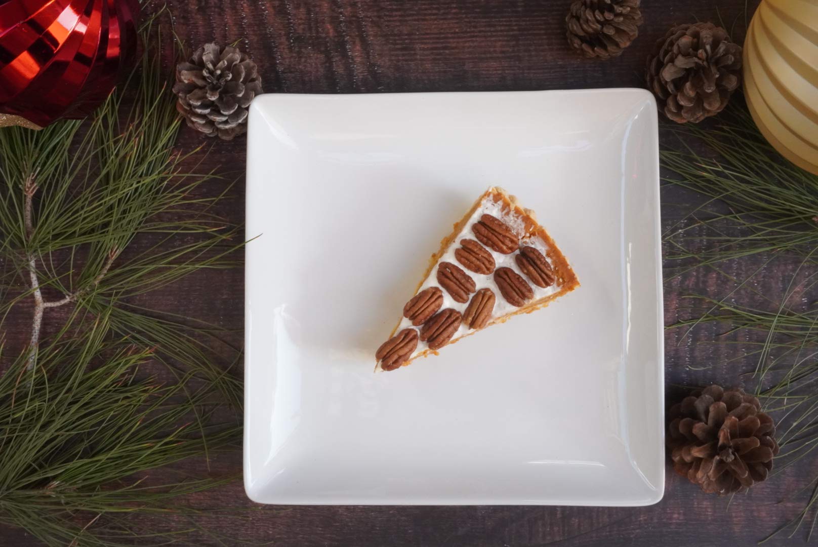 toasted La Nogalera pecan halves on a baking sheet showing enhanced aroma and color