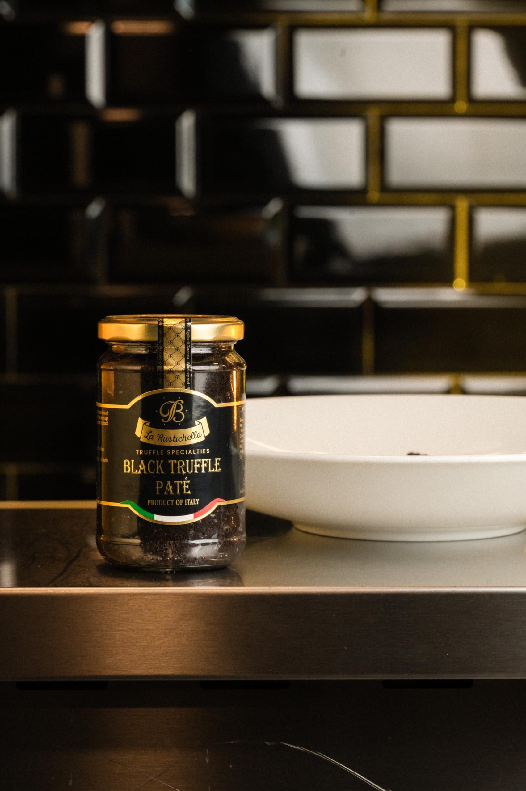 La Rustichella open jar close-up showing smooth patè texture and richness