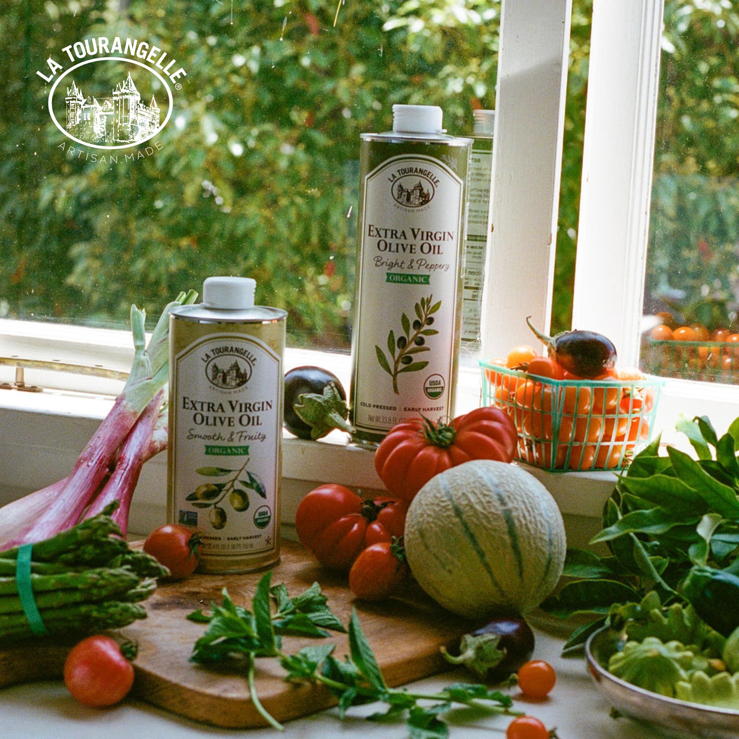 La Tourangelle bottle on kitchen counter beside salad demonstrating finishing use benefit