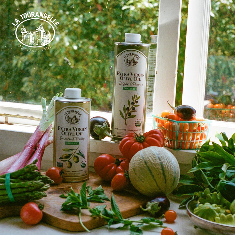 La Tourangelle bottle on kitchen counter beside salad demonstrating finishing use benefit