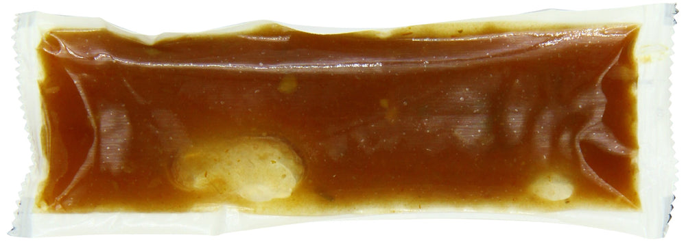 La Victoria single-serve packet on taco illustrating easy portioning benefit