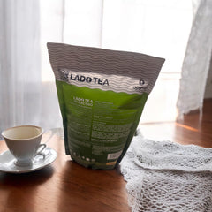 LADOPHAR brewed cup of artichoke tea presenting clear pale infusion and calming refreshment