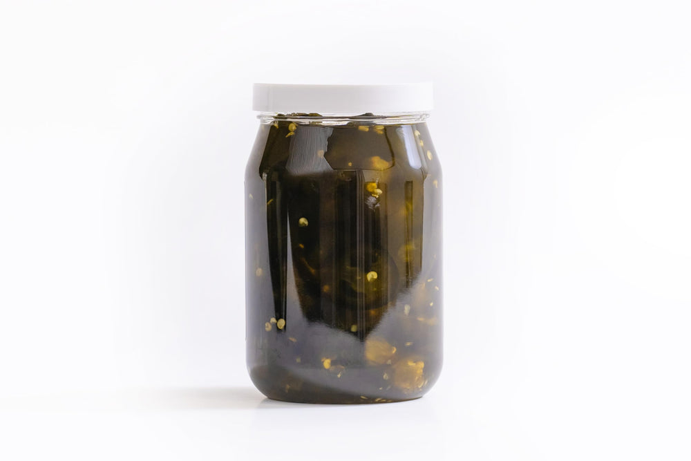 Laffitte's close-up of jalapeño slices showcasing texture and glossy syrup benefit